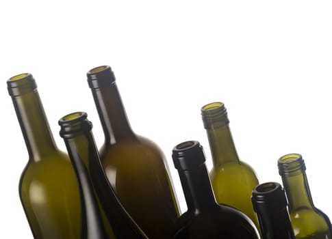 Empty wine bottles isolated on white background.