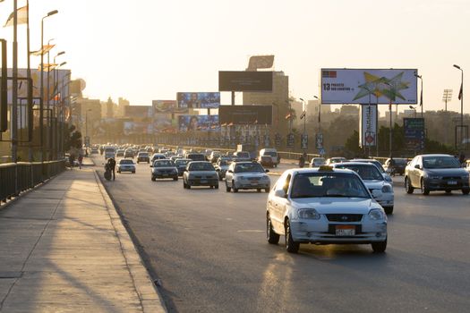 Cairo, Egypt - March 4, 2016: Heavy traffic on the 6th October bridge in central Cairo at dusk.