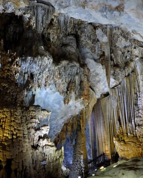 Paradise cave, an amazing, wonderful cavern at Bo Trach, Quang Binh, Vietnam, underground beautiful place for travel, heritage national with impression formation, abstract shape from stalactite