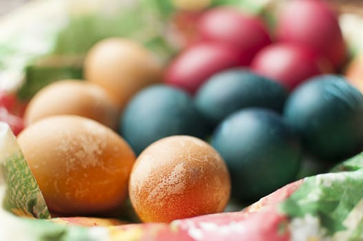 Painted easter eggs in a basket