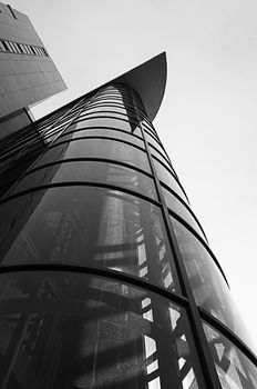Perspective of exterior elevator in monochrome. Glass elevator.