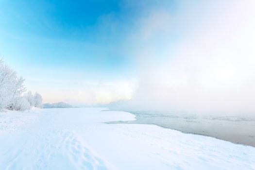 Fog on the river in winter