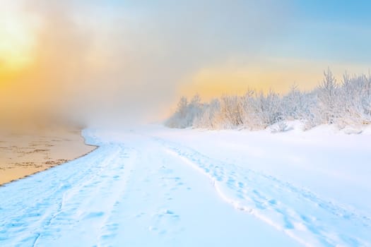 Fog on the river in winter