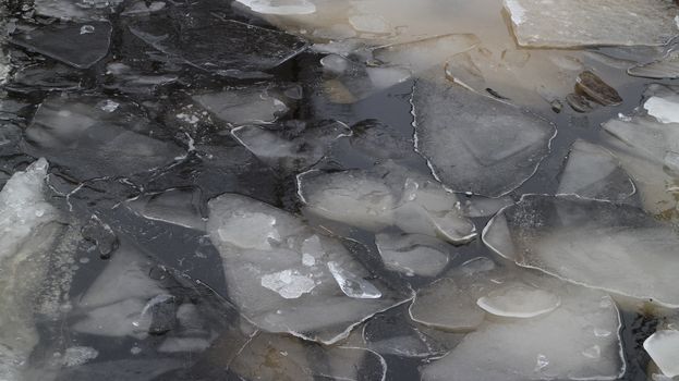 Winter nature background with blocks of ice on frozen Sea