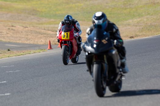 BROADFORD, VICTORIA/AUSTRALIA - MARCH 13: A mix of road and race bikes tussle against each other at The Broadford Motorcycle Complex.