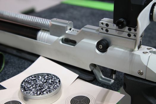 aluminum can of lead pellets for air rifle and air rifle