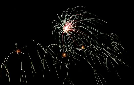 multicolored fireworks in the night sky