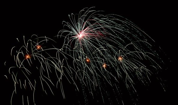 multicolored fireworks in the night sky