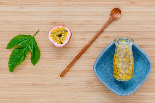 Fresh passion fruits set up on wooden background.