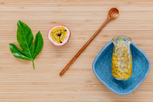 Fresh passion fruits set up on wooden background.