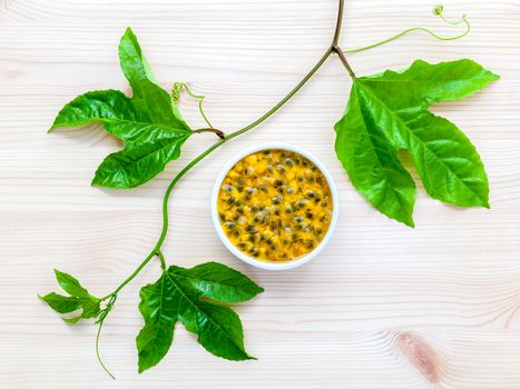 Fresh passion fruits set up on wooden background.