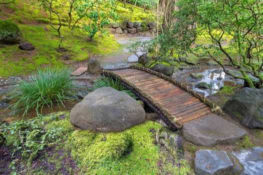 Bamboo Foot Bridge Over Creek in Springtime at Japanese Garden