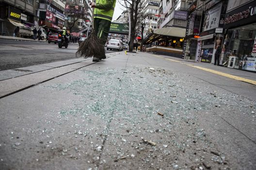 TURKEY, Ankara: Shattered glass is seen at the scene of  a car bombing in Guven Park in the Kizilay district, a key transport hub of the Turkish capital city Ankara on March 14, 2016, one day after a car bomb exploded in Ankara  killing at least 32 people and wounding more than 100, according to the health ministry. On February 2016, a bomb attack claimed by a Kurdish militant group on a military convoy in Ankara killed 28 people and wounded dozens more. On October 2015, more than 100 people were killed in a double-suicide bombing at a Kurdish peace rally in Ankara. 