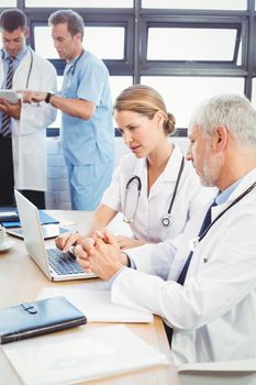 Medical team interacting at a meeting in conference room