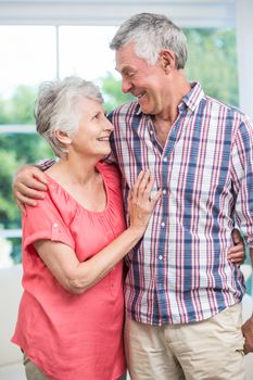 Senior couple looking face to face at home 