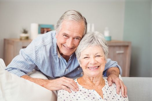 Portrait of romantic senior man with his wife at home