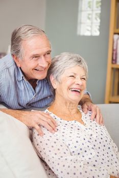 Romantic senior man with his wife at home