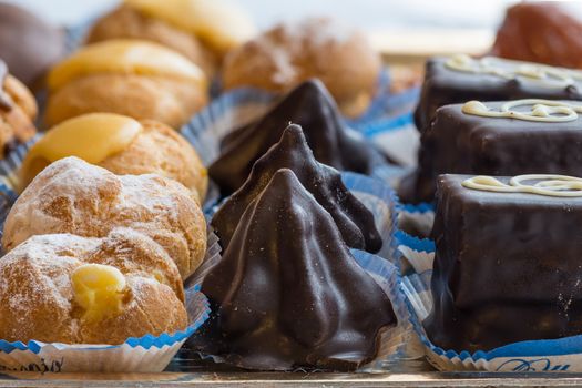 In the pictured colorful pastries with candied,cream and chocolate, the real Italian confectionery.