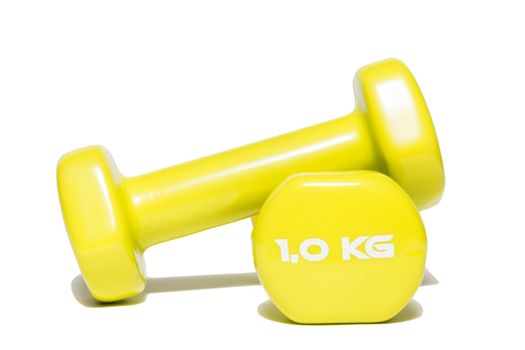 The photo shows a dumbbell on a white background