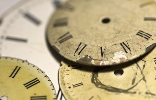 Horizontal top view of a set broken hand watches 