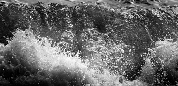 Black and white Beach rock and blue sea in Thailand