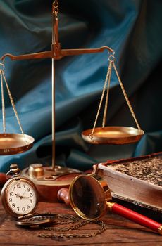 Vintage still life with old brass weight scales and other things