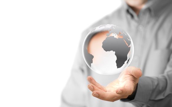 Caucasian man holding a glass planet, copy space on the left side of the image. Global business background concept over white.