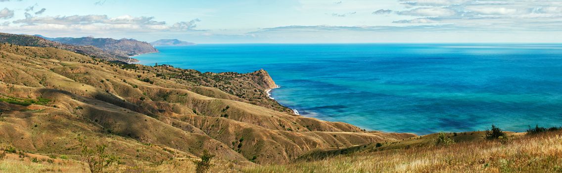 Blue sea waters in spring. Sea coast of Crimea, Stitched Panorama