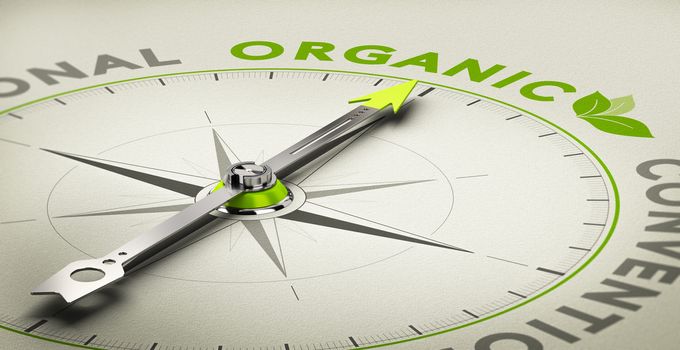 Compass with needle pointing the word organic. Green and beige tones, Conceptual illustration for healthy eating and organic farming.