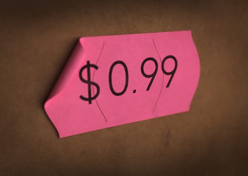 Psychological pricing printed on a pink label. concept image for illustration of prices psychological impact.