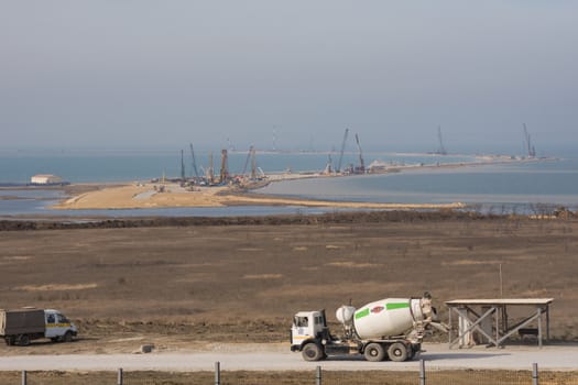 Taman, Russia - March 8, 2016: A view of the Tuzla Spit and the construction of transport passage through the Kerch Strait from the Taman, which will connect the Kerch and Taman peninsula, as of March 2016