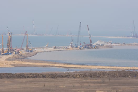 Taman, Russia - March 8, 2016: View of the construction of transport passage through the Kerch Strait from the Taman, which will connect the Kerch and Taman peninsula, as of March 2016