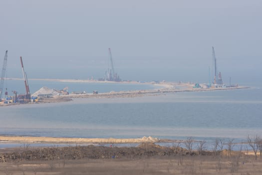 Taman, Russia - March 8, 2016: View of the construction of transport passage through the Kerch Strait from the Taman, which will connect the Kerch and Taman peninsula, as of March 2016