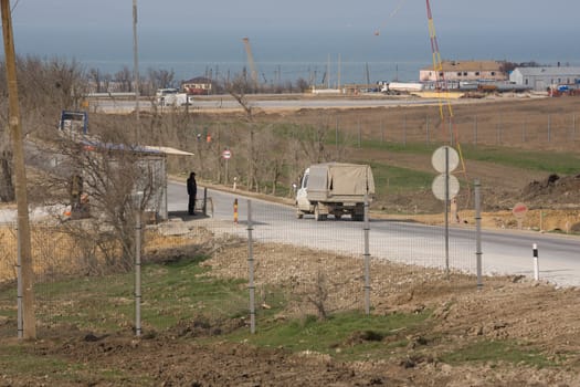 Taman, Russia - March 8, 2016: View of communicating on a closed area of construction of transport passage through the Kerch Strait from the Taman, which will connect the Kerch and Taman peninsula, as of March 2016