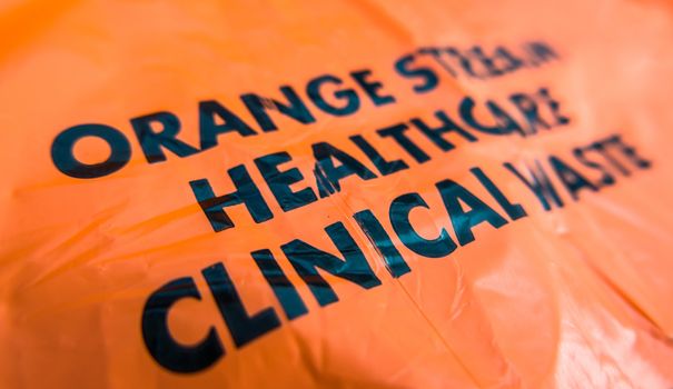 Detail Of An Orange Plastic Bag For Clinical Waste In A Hospital