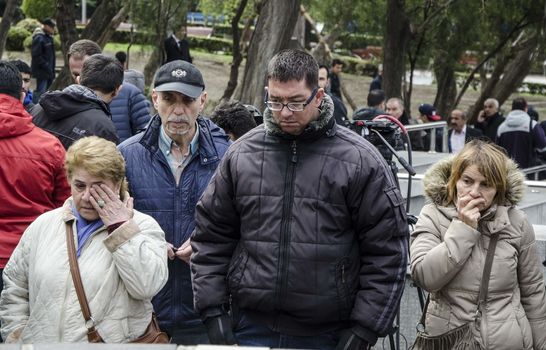 TURKEY, Ankara: People gather at a makeshift memorial for the victims of Sunday's suicide bomb attack in Ankara, on March 15, 2016 in Ankara, near the site of a suicide car bombing on March 13 that left 35 dead.Turkish warplanes pounded Kurdish rebel bases in northern Iraq on March 14, the day after a suicide car bomb tore through downtown Ankara killing at least 35 people, the third attack on the capital in five months. There was no immediate claim of responsibility for the latest carnage, which reduced cars and buses to charred hulks on a busy road in the heart of the city, wounding more than 120 people. 