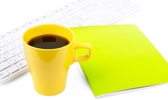 Cup of coffee with keyboard and notebook on isolated white background