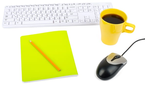 Cup of coffee with keyboard, mouse and notebook on isolated white background