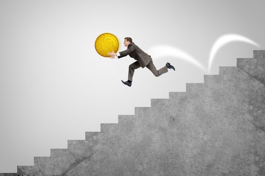 Businessman with big gold coin running fast down stairs