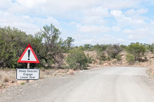 A steep descend warning on the link road in the Mountain Zebra National Park near Cradock in South Africa