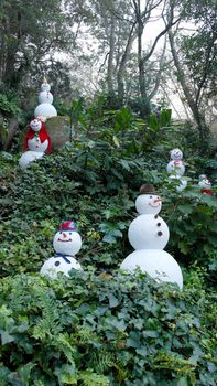 Detail of snowmen in the forest