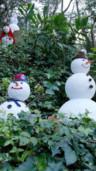 Detail of snowmen in the forest