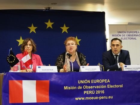PERU, Lima : Romanian jurist Renate Weber (C), head of the European Union's Electoral Observation Mission to Peru, participates in a press conference on March 15, 2016, upon the mission's arrival in Lima, in advance of the April 10 general election. Weber expressed the mission's concern over the exclusion of presidential candidates at only a few weeks from the election. Flanking Weber are press officer Silvia de Felix (L) and the mission's deputy chief Domenico Tuccinardi (R).