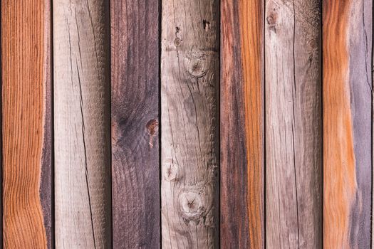 Rustic weathered barn wood background with knots and nail holes