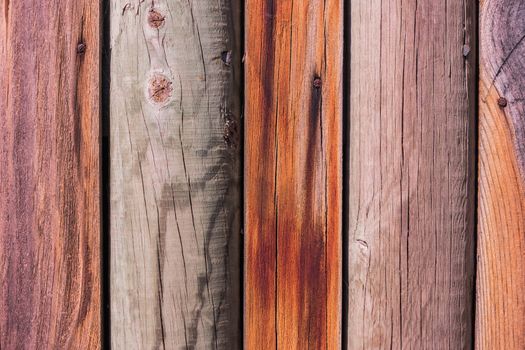 Rustic weathered barn wood background with knots and nail holes