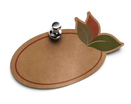 eco friendly label, kraft paper with drawing of leaves fixed on a white wall with metal thumbtack 