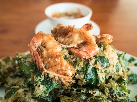 Soft focus of fried shrimp with vegetable fritters crisp.