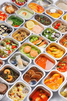 Separate portions of different food into containers