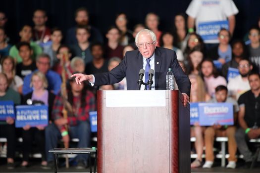 UNITED STATES, Phoenix: Democratic presidential candidate Sen. Bernie Sanders speaks to a crowd gathered at the Phoenix Convention Center during a campaign rally on March 15, 2016 in Phoenix, Arizona. Hillary Clinton won the Democratic primary elections in Florida, North Carolina and Ohio, while Missouri and Illinois remain tight races.