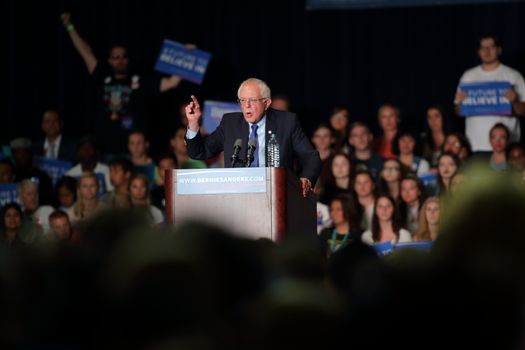 UNITED STATES, Phoenix: Democratic presidential candidate Sen. Bernie Sanders speaks to a crowd gathered at the Phoenix Convention Center during a campaign rally on March 15, 2016 in Phoenix, Arizona. Hillary Clinton won the Democratic primary elections in Florida, North Carolina and Ohio, while Missouri and Illinois remain tight races.